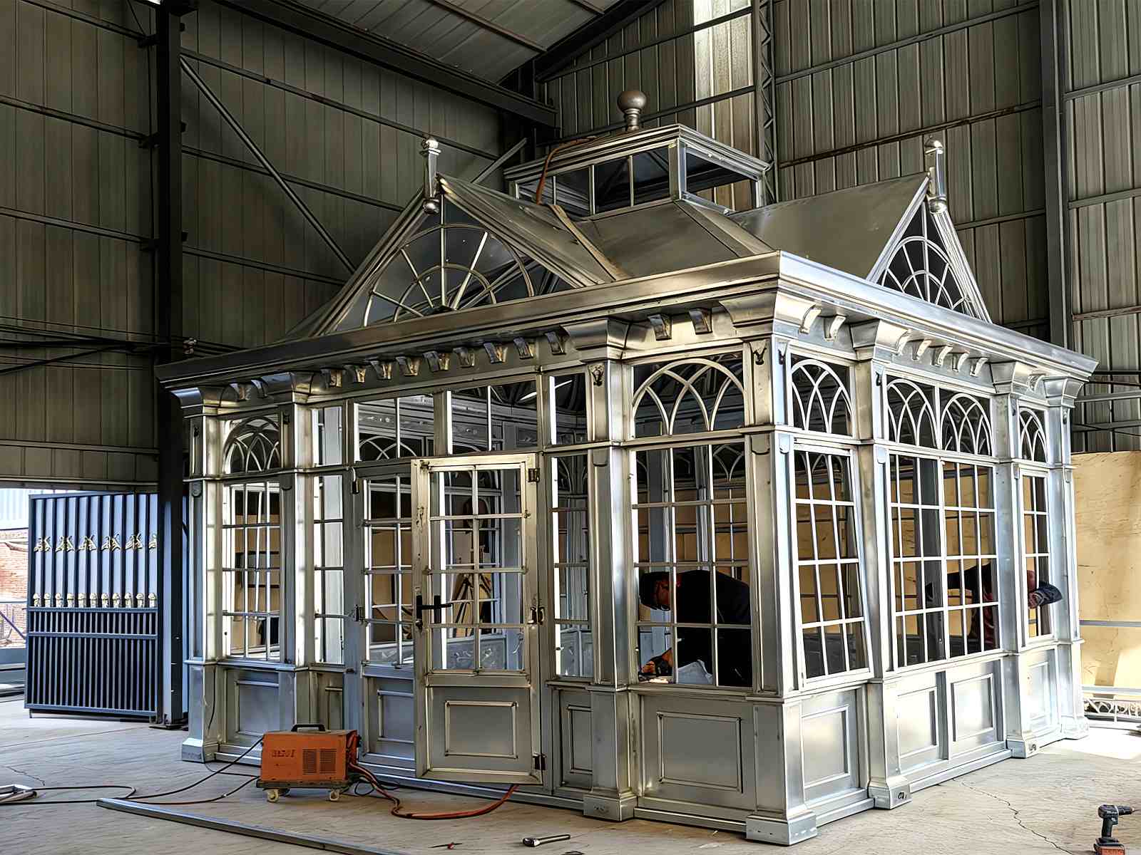 Victorian Greenhouse: Custom Steel Conservatory With Elegant Metal Roof